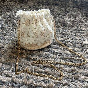 Ivory Floral Crochet Drawstring Crossbody Bag with Gold Chain